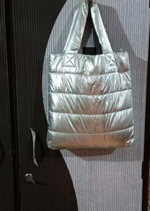 Justice Silver Puffer Tote Bag