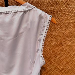 White Sleeveless Top