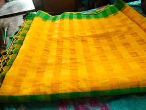 Yellow Saree  Green Blouse.