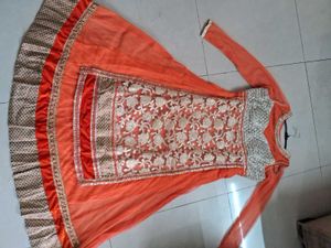 Orange Golden Embroidered Net Anarkali Gown