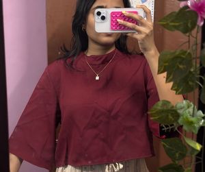 maroon high-neck flowy top