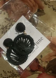 Black woven statement earrings