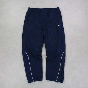 NIKE PARACHUTE BAGGY TRACKS.