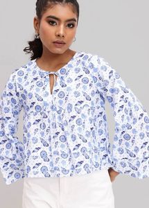 white top with blue botanical prints