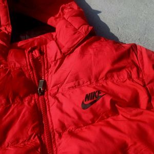 A Red Colour Nike Puffer Jacket