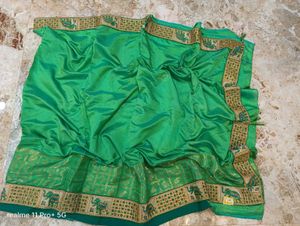 Elegant Green Silk Saree with Elephant Border