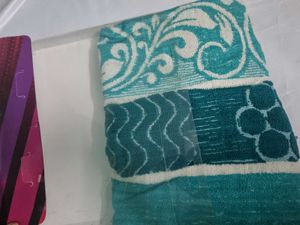 Teal Patterned new bath towel.