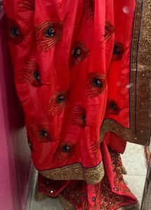 Elegant Pink Sari with Peacock Design