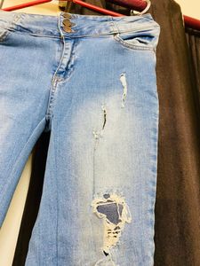 Select Skinny Distressed Jeans