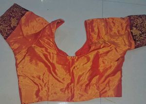 Orange  and maroon Embroidered Saree