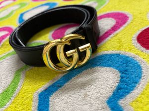 Black belt with golden buckle
