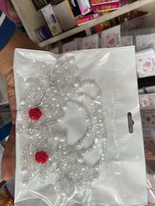 White Coloured Pearl And Stone Tiyara With Rose