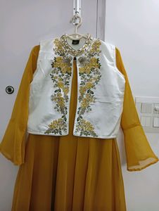 Embroidered yellow anarkali kurta with embroidered cream jacket