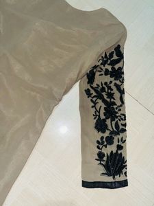 Elegant Beige Tunic with Black Embroidery