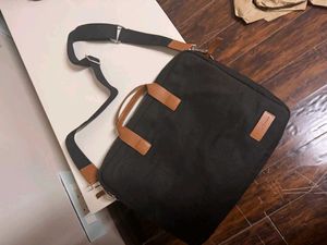 &#34;Stylish Laptop Bag with Brown Leather Handle