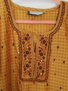 30% Offer. Embroidered Mustard Kurta