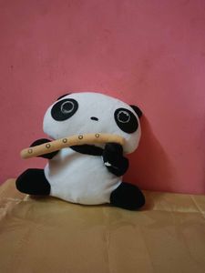 Tarepanda plush toy playing a flute