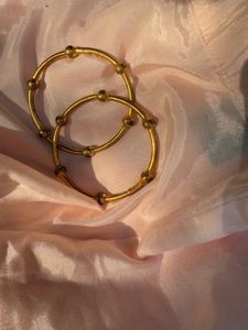 pair of gold bangles