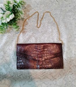 maroon vintage leather snakeprint bag