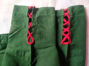 Green Blouse with Red Trim