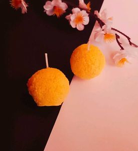 A Combo Of 6 Laddu  Candle