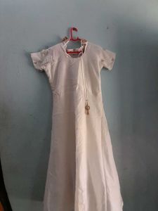 Beautiful White Coloured Gown. Festive Type.