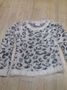 it's a top of woolen and fur pretty warm