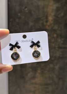Black Pearl N Bow Earrings