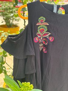 black Shoulder Cut top