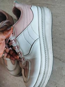 good white color sneaker shoes