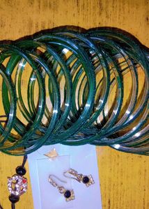Green Colour Velvet Glass Bangles With A Pendant.
