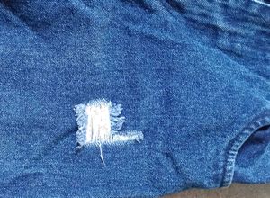 Distressed Denim Jeans