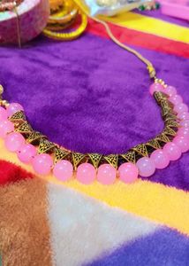 A Preety Baby Pink Neckpiece With Earrings