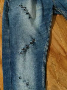 Ripped Blue Denim Jeans