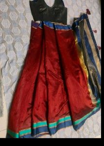 beutiful maroon saree with sleeveless blouse