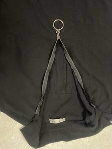 Chic Black Top with Ring Detail