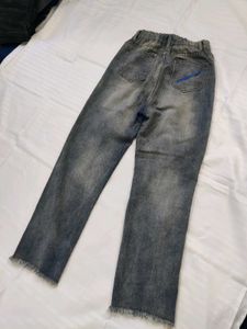 Women High-Rise Heavily Washed Distressed Jean