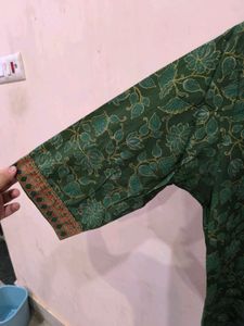 Green floral print kurti with golden detailing