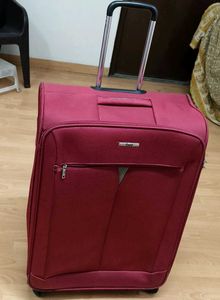 VIP Maroon Soft Textured With Wheels Trolly Bag