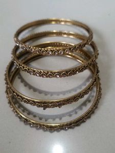 Elegant Gold Tone Bangle Set