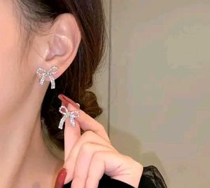 Korean Silver Bow Stone Earrings