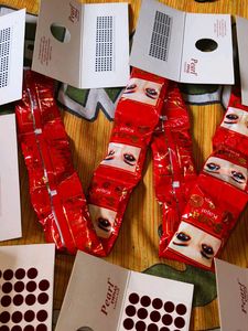 13 bindi sets and 12 kajal set