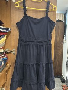 A pretty tiered navy blue dress