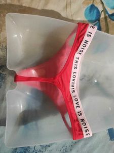Red &#34;Love is Noise&#34; Thong