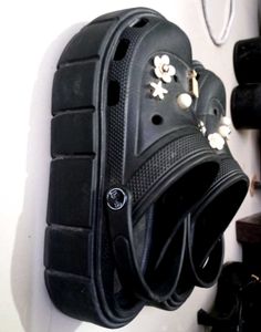 Platform Crocs with charms