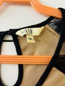Beige Top With Black Net Sleeves