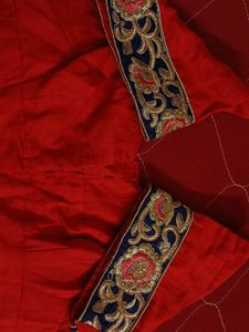 Red Fabric with Embroidered Trim