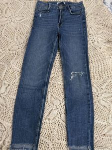 Ripped Knee Denim Jeans