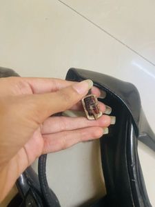 Chic Black Heels with Bow Detail