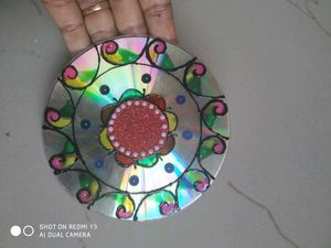 A pair of diya holders